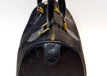 Kuferek Vuitton elegandzki