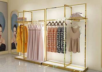 Wyposażenie  sklepu Dotacje ,regały ,wieszaki ,lady, przebieralnie ,