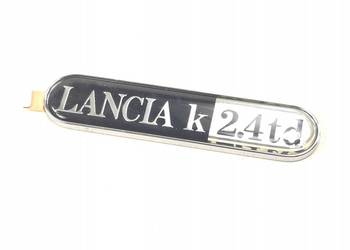 EMBLEMAT NA BŁOTNIK "LANCIA k 2,4JTD" LANCIA KAPPA 94-01 NOWY ORYG 60661547 EMBLEMAT NA BŁOTNIK "LANCIA k 2,4JTD" LANCIA KAPPA 94-01 NOWY ORYG 60661547