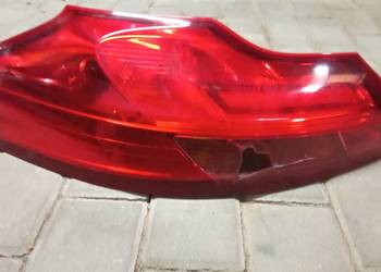 Opel Insignia A lampa lewa tył oryginał uszkodzony klosz