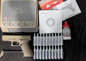 Glock 19x Coyote Co2 4,46mm (umarex), 1500 kulek, 20 butli Co2, 50 tarcz
