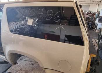 ĆWIARTKA BŁOTNIK LEWY TYŁ CADILLAC ESCALADE ESV