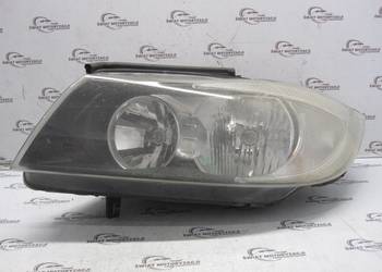 BMW E90 06r lampa lewa przód 6942723 89311650 ANGLIK