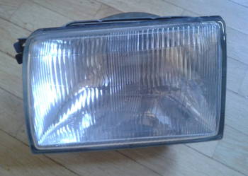 REFLEKTOR LAMPA PRZÓD lewa MITSUBISHI TREDIA 1984r stanley