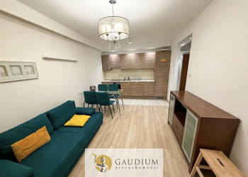 2 - pok. mieszkanie z miejscem postojowym w hali