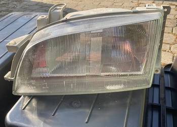 NOWY Reflektor Lewy Przód Toyota Carina E T19 Szklany CARELLO Magneti Marel