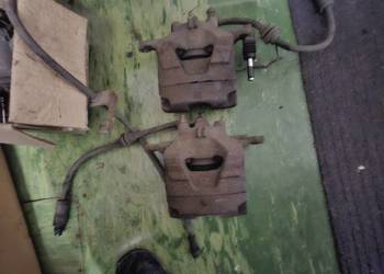 Opel Astra J  Przód strona prawa lewa Zacisk hamulcowy przedni GM 6003