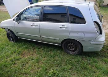 Suzuki liana czesci  lampy drzwi maska zawieszenie amortyzatory