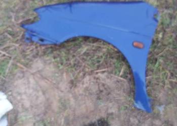 Blotnik przód lewy RENAULT SCENIC  1 granatowy Blotnik przód lewy RENAULT SCENIC  1 granatowy