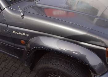 BŁOTNIK PRAWY PRZÓD MITSHUBISHI PAJERO