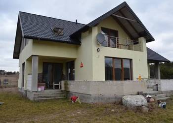 Nieruchomość gruntowa zabudowana budynkiem mieszkalnym o pow. 153,50m2