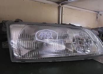 HYUNDAI H1 H-1 PRAWA LAMPA REFLEKTOR ORYGINAŁ SZKLANA pod halogen