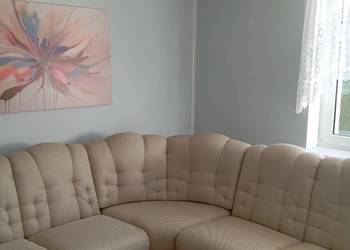 Sofa narożna rozkładana z funkcją spania oraz fotel do kompletu