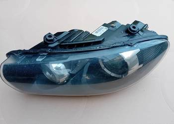 VW Sirocco Bi-xenon reflektor, lampa lewy przód.