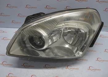 NISSAN QASHQAI I J10 07r lampa lewa przód ANGLIK 26060JD000