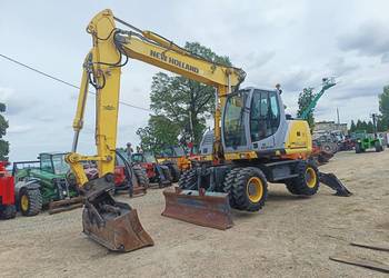 Koparka kołowa News Holland MH Plus nie cat liebherr atlas terex LONG