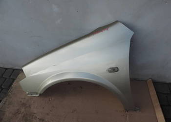 NISSAN PRIMERA P12 BŁOTNIK LEWY PRZEDNI EY2Z