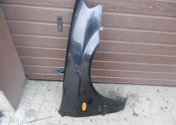 Błotnik prawy MAZDA 323