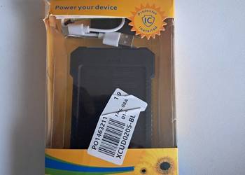 nowy power bank z ładowaniem solarnym i lampką, uszkodzone opakowanie