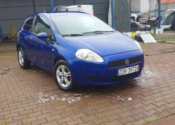 Błotnik prawy Fiat Grande Punto kolor 599A