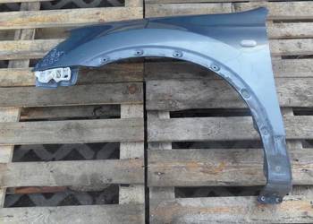 NISSAN QASHQAI I 09r błotnik lewy przód