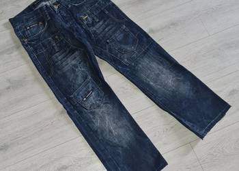 Spodnie chłopiec jeans przecierane granat rozm 164