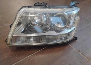 Reflektor lewy Suzuki Grand Vitara