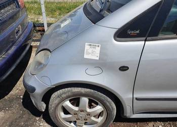 BŁOTNIK LEWY PRZÓD MERCEDES A KLASA W168 761