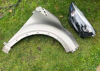 Renault Captur 1 blotnik prawy przod lampa