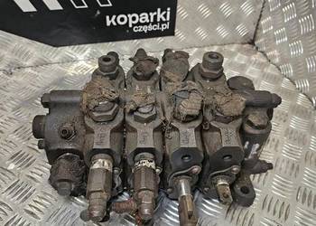 4-sekcyjny rozdzielacz hydrauliczny Husco New Holland 555E, 675E i LB75B