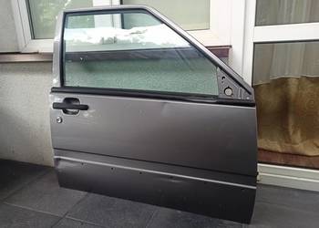 Volvo 740 940 drzwi przednie prawe pasażera klamka mechanizm