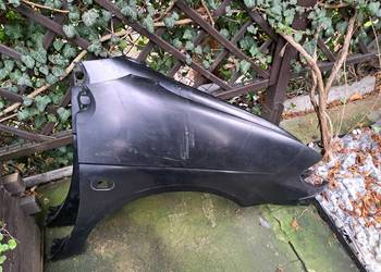 Renaul 96-99r błotnik prawy przedni 7700844960