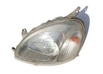 Yaris I Lampa przednia lewa lewy przod Oryginal