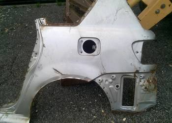 TOYOTA AVENSIS VERSO BŁOTNIK TYŁ LEWY 2000 2003