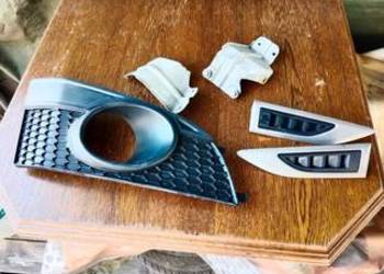 Chevrolet Captiva 2012 kratka wspornik błotnika zderzaka