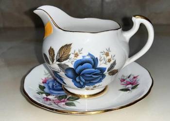 Mlecznik Dorchester. Made in England.  Z granatową różą.   Cena 55 zł.   Po