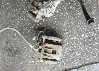 KIA CARENS IV 1.7 CRDI ZACISK LEWY PRAWY TYL 14R