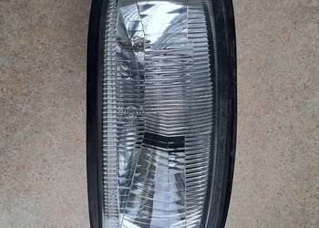 Reflektor ( lampa ) lewy oryginalny i kompletny do Nissan 100NX