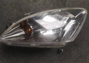 Mitsubishi Lancer 2003 2006 lampa lewa ciemna oryginał