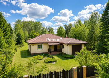 Dom z 35-arową działką i 3 garażami