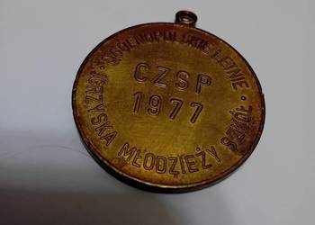 Medal Ogólnopolskich Letnich Igrzysk Młodzieży Szkół z 1977 roku. 