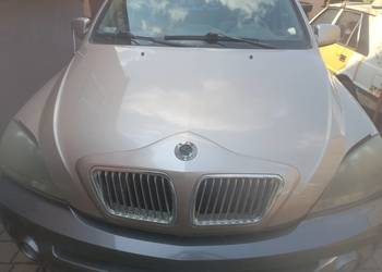 Kia Sorento 1 I 2.5 crdi - maska grill atrapa "bmw" - samochód na części