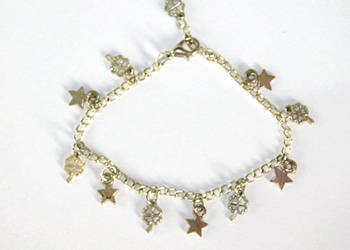 delikatna bransoletka koniczynki gwiazdki