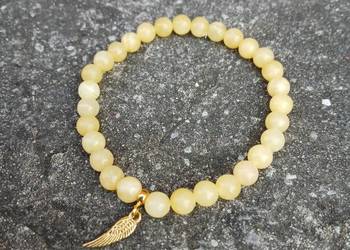 Bransoletka damska z Nefrytu bursztynowego zdobiona skrzydełkiem