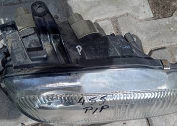 Mazda 323F BA Lampa przednia lewa, prawa