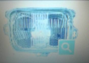 REFLEKTOR (LAMPA Z RAMKA 87-92 Le MITSUBISHI BUS L300 81-92