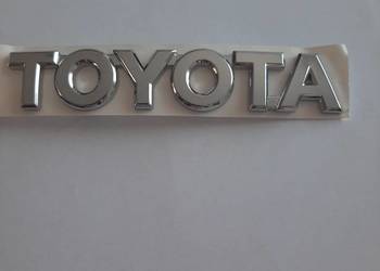 EMBLEMAT,ZNACZEK TOYOTA OE 75446-OH010 -ZDERZAK TYŁ