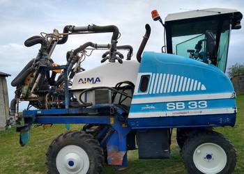 Sprzedam kombajn New Holland -BRAUD SB 33 zintegrowany z opryskiwaczem