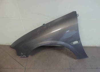 BŁOTNIK LEWY PRZÓD Opel Vectra B