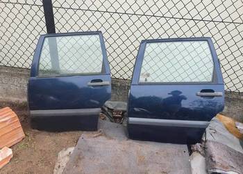 Drzwi tylne lewe lewy tył Volvo 850 granatowe 417-21